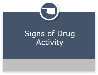 Signs of Drug Activity Button